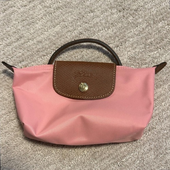 Longchamp Handbags - NWT Longchamp Le Pliage Pink Cosmetic Bag | Stylish & Durable Case